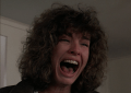 a closeup shot of a woman screaming