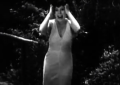 a black and white image of a woman screaming